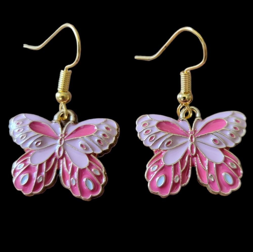 Butterfly earrings in pinks.